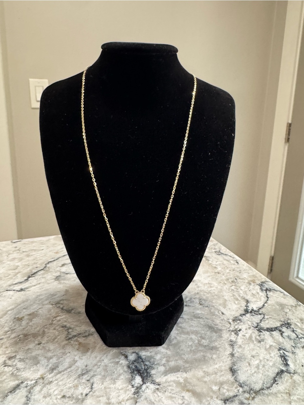 10K gold necklaces with a pearl clover pendant 18”